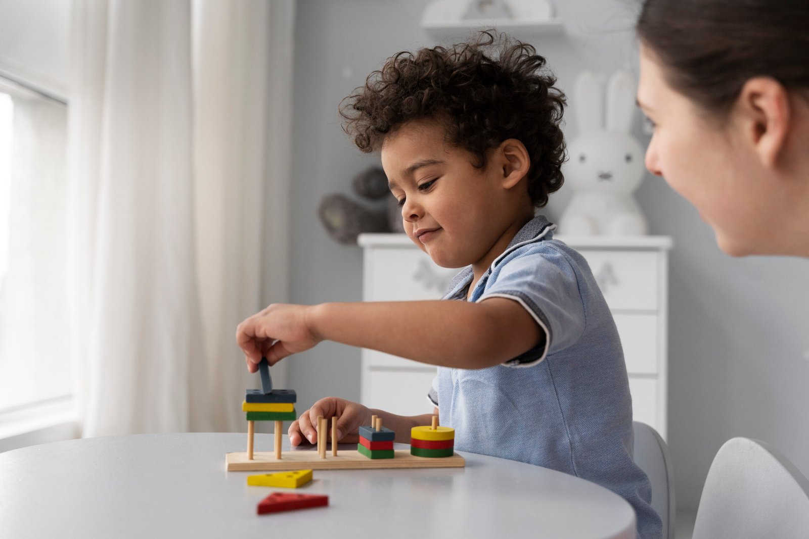 close-up-child-enjoying-didactic-game