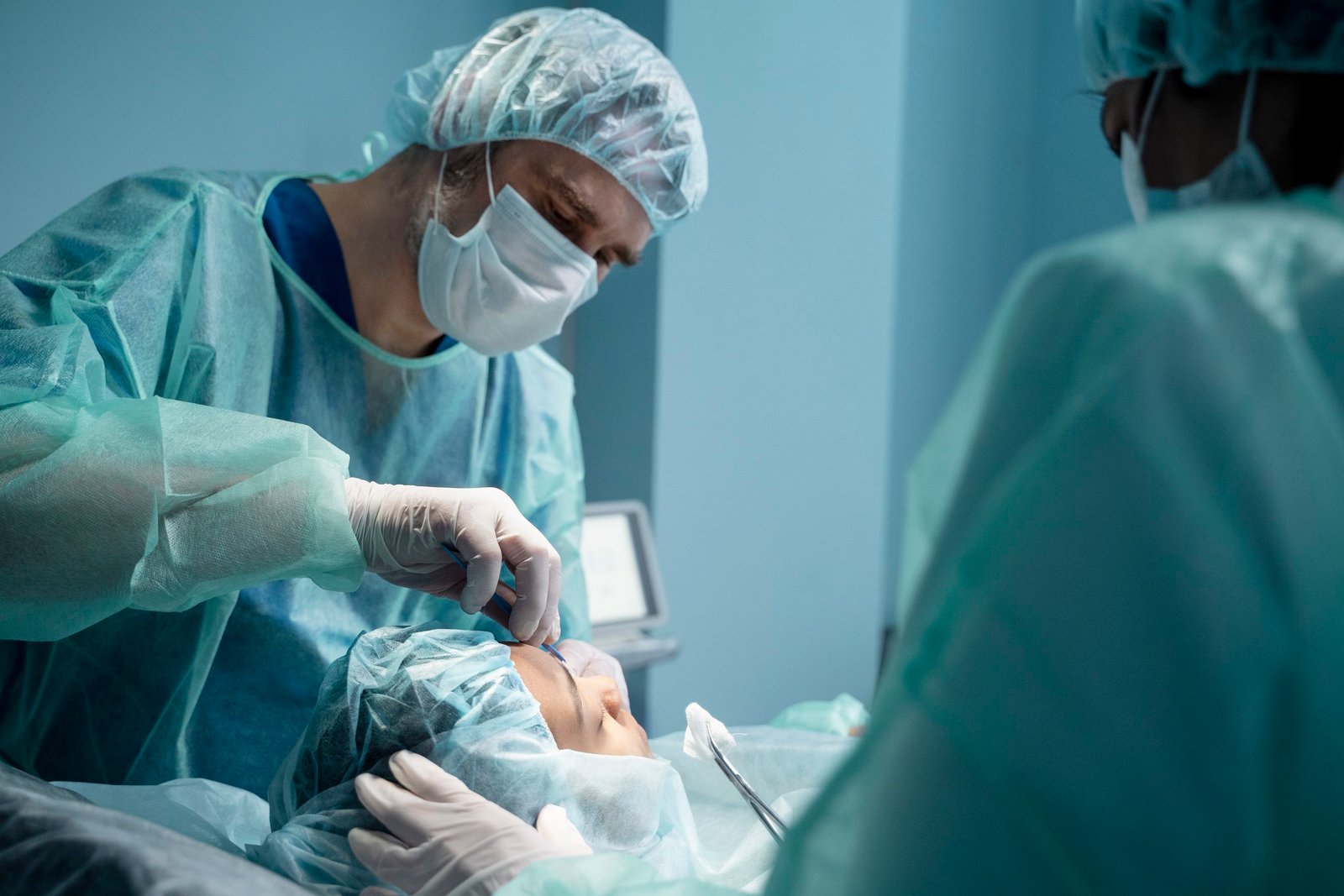 doctors-performing-rhinoplasty-operating-room