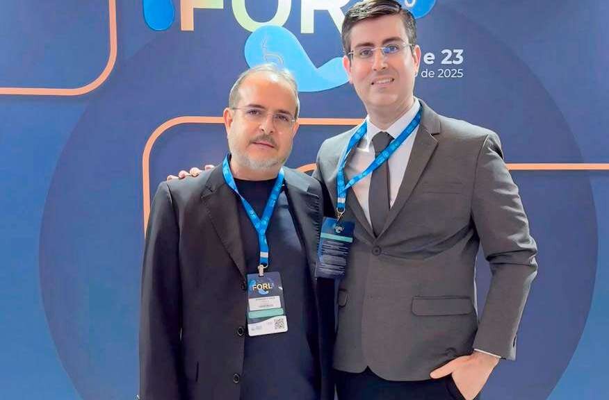 Os otorrinolaringologistas Jeferson d’Avila e Daniel d’Avila no congresso